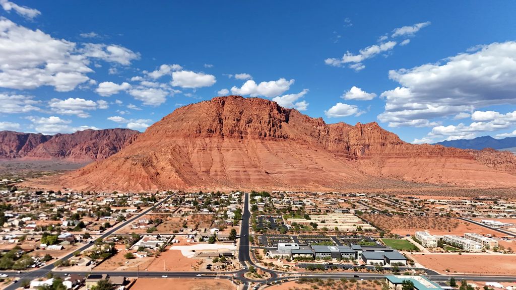 Red Mountain's sandstone cliffs rising above Ivins, Utah